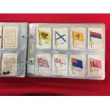 Cigarette Cards: Early 20th cent. album containing 17 complete sets of silks, issued by various
