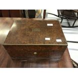 19th cent. Burr walnut stationery box with side and bottom secret drawers, the lid opening to reveal