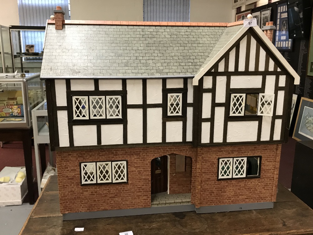 20th cent. Dolls House: Tudor style with some furniture.