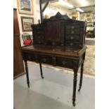 19th cent. Mahogany desk drop down slope opening to reveal a stationery cupboard flanked by banks of