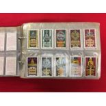 Cigarette Cards: Early 20th cent. album containing 20 sets of cards issued by Gallaher Ltd including