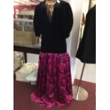 Fashion: Frank Usher evening gown, c70s/80s. Black velvet bodice, deep V front and back, sequin