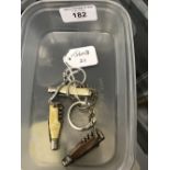 Corkscrews: Bottle shaped screw with blade, faux mop handle and key ring holder. Richards of