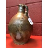 17/18th cent. Brown Salt glazed Bellarmine jug, 11ins.