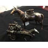 Smoking Requisites: Cigarette lighters, Japanese horse novelty table lighter and a Spanish horse and