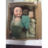 Early 20th cent. Dolls: Three bisque dolls 8ins. 5½ins. 2ins. A composite doll German made, a/f. 4¼