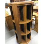 20th cent. Light oak revolving CD/ DVD holder.