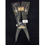 Corkscrews/Wine Collectables: Ladies ebony leg opens to reveal a pair of boot pulls and a steel