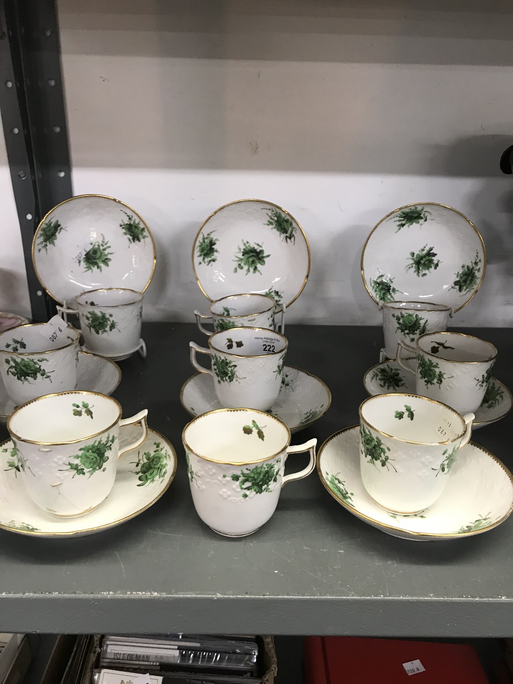 Early 19th cent. Spode tea cups and saucers, decorated with green foliage with gilt bands, (8