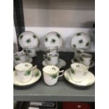 Early 19th cent. Spode tea cups and saucers, decorated with green foliage with gilt bands, (8