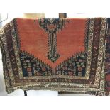Rugs: 19th cent. Shahsavan runner red ground with five part bar-medallion in dark blue with matching