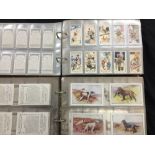 Cigarette Cards: Two albums containing 14 complete sets of W.A & A.C. Churchman cigarette cards