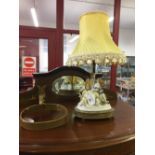 20th cent. Porcelain lamp. Two figures, male serenading his female companion. Adjustable feet.