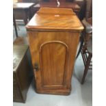 19th cent. Mahogany single door pot cupboard rising off a plinth. 15½ins. x 30ins. x 14ins.