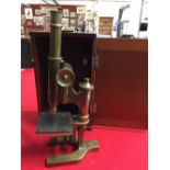 Scientific Instrument: Brass microscope by W. Watson & Son London with mahogany case & spare lens.