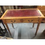 Modern pine desk with leather skiver. 35ins. x 32ins. x 17½ins.