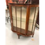 20th cent. bow fronted display cabinet.