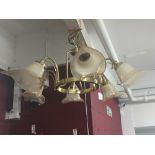 Lighting: 20th cent. Brass effect chandelier, with six bayonet fitting sockets with glass shades
