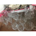 20th cent. Glassware: Cut glass water jug, wine glasses, whiskey glasses, flutes, fruit bowl, and