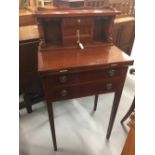 20th cent. Mahogany ladies desk. Pigeon holes and drawers above two drawer base and fold over