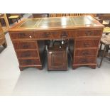 20th cent. Repro mahogany twin pedestal desk, nine drawers, leather skiver on bracket supports.