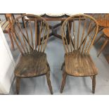 19th cent. Elm stick back chairs - a pair.