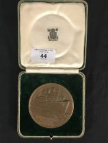 OCEAN LINER: Queen Mary maiden voyage medallion in Royal Mint case of issue. 13¾ins.