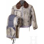 A Two-Piece Winter Flight SuitTwo-part grey winter flight suit of matching fur-lined jacket and