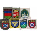 Sieben Ärmelabzeichen für FreiwilligenverbändeDrei farbig gewebte Exemplare ("Aserbaidschan", "