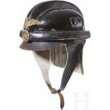 A NSKK Crash HelmetMolded smooth black leather with short visor, single black ventilation grommet at