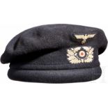 A Panzer BeretBlack cloth, oval shaped protective helmet for panzer crews, lined with black oil