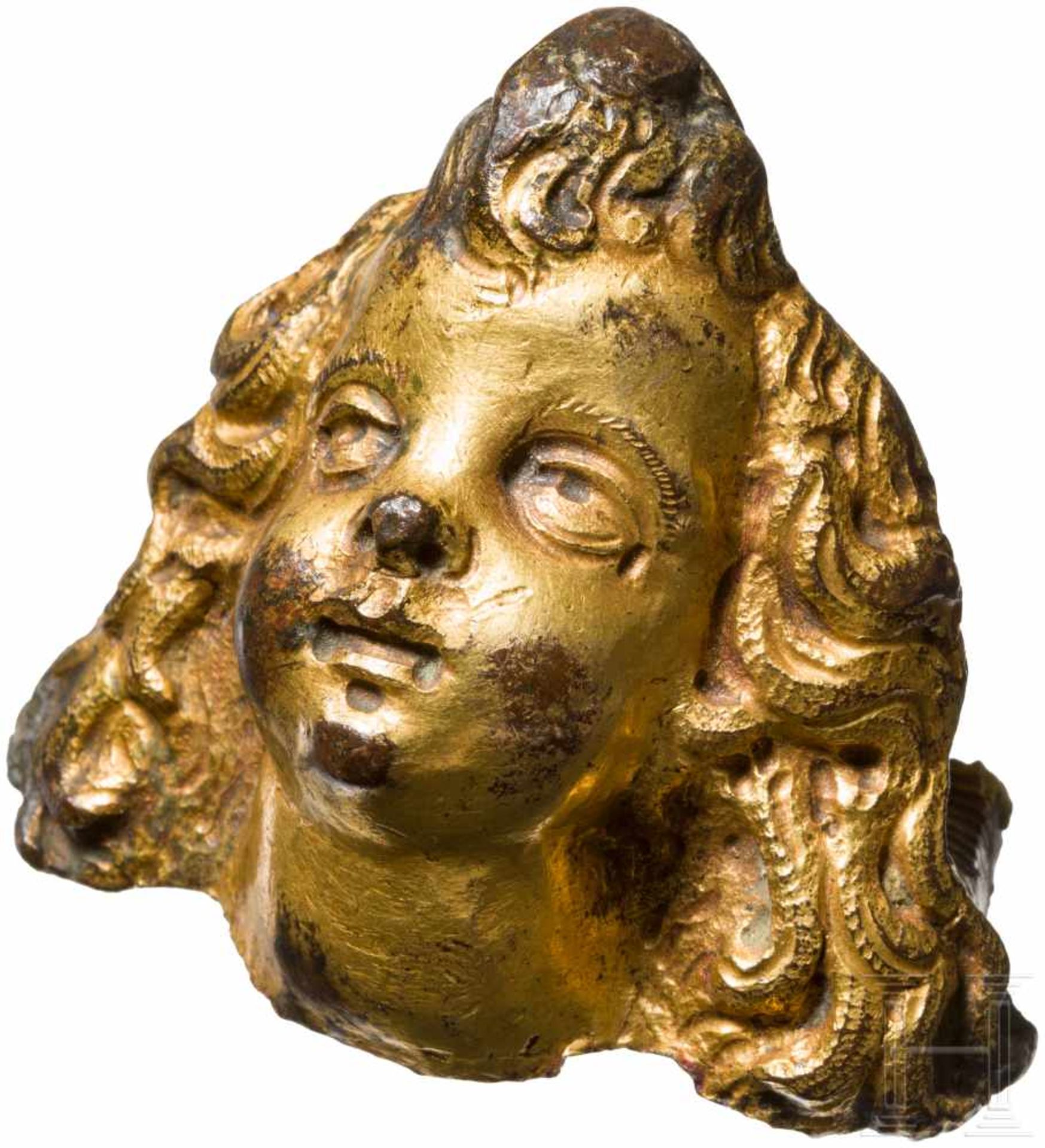 Vergoldetes Putto-Köpfchen, Italien, 16. Jhdt.Hohl gegossenes Köpfchen aus feuervergoldeter Bronze