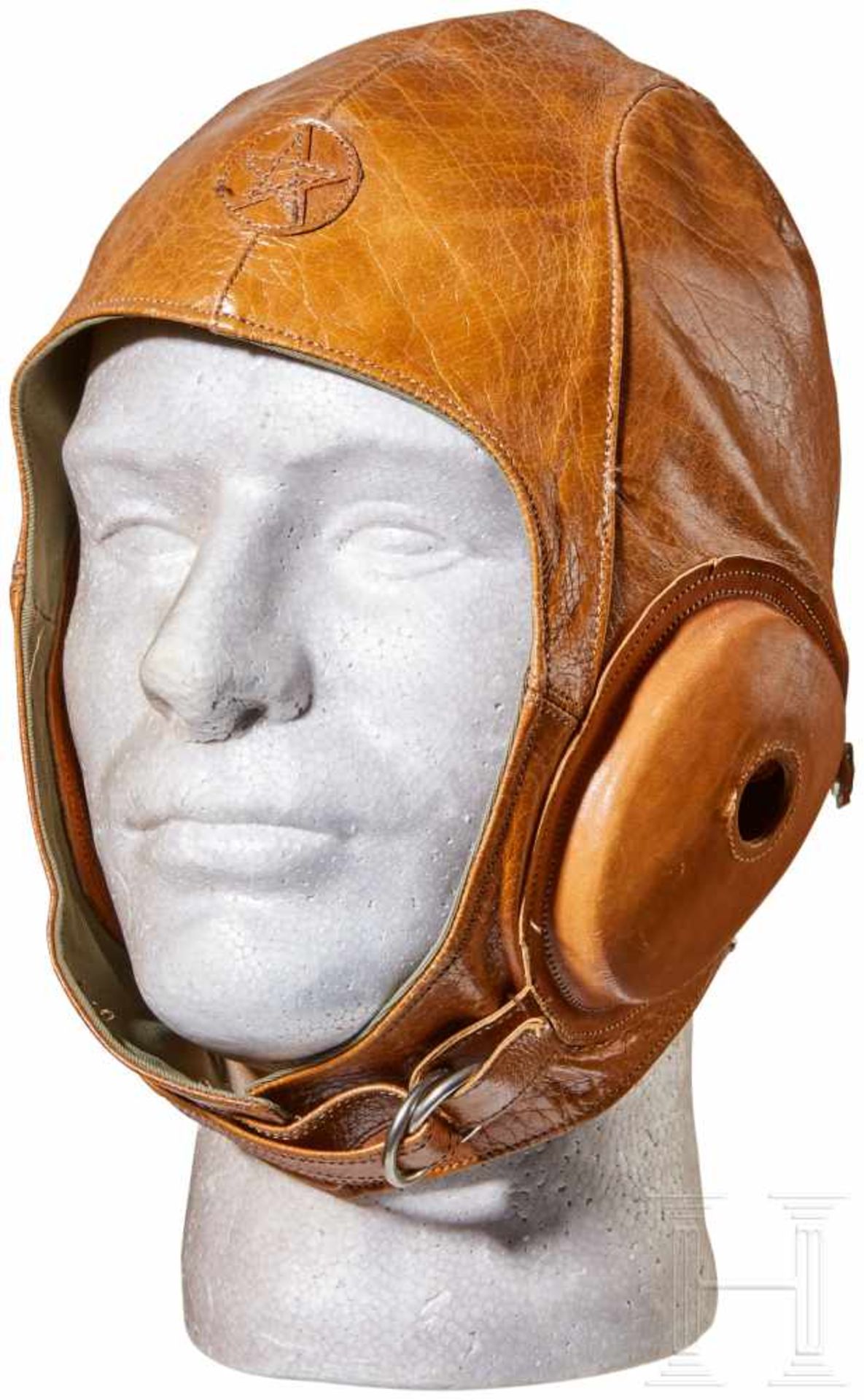 A Japanese Army Pilot Flight HelmetOrange-brown leather body, stitched star in circle at forehead,