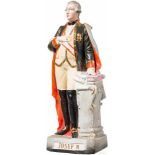 Kaiser Joseph II. - farbig gefasste KeramikfigurDer Kaiser in Uniform mit Umhang und Orden, die