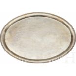 An oval Serving Platter from Silver ServiceUnmarked platter, stamped "Wellner", "60" on top surface.