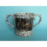 A loving cup set with scroll handles: Jolly Topers (406) black mottled ground, restored, 127mm (