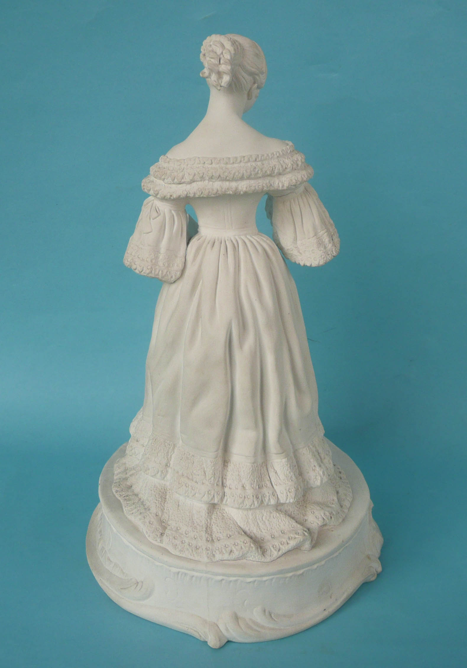 Queen Victoria: a good white bisque porcelain figure probably by Minton depicted in a long dress - Image 2 of 3