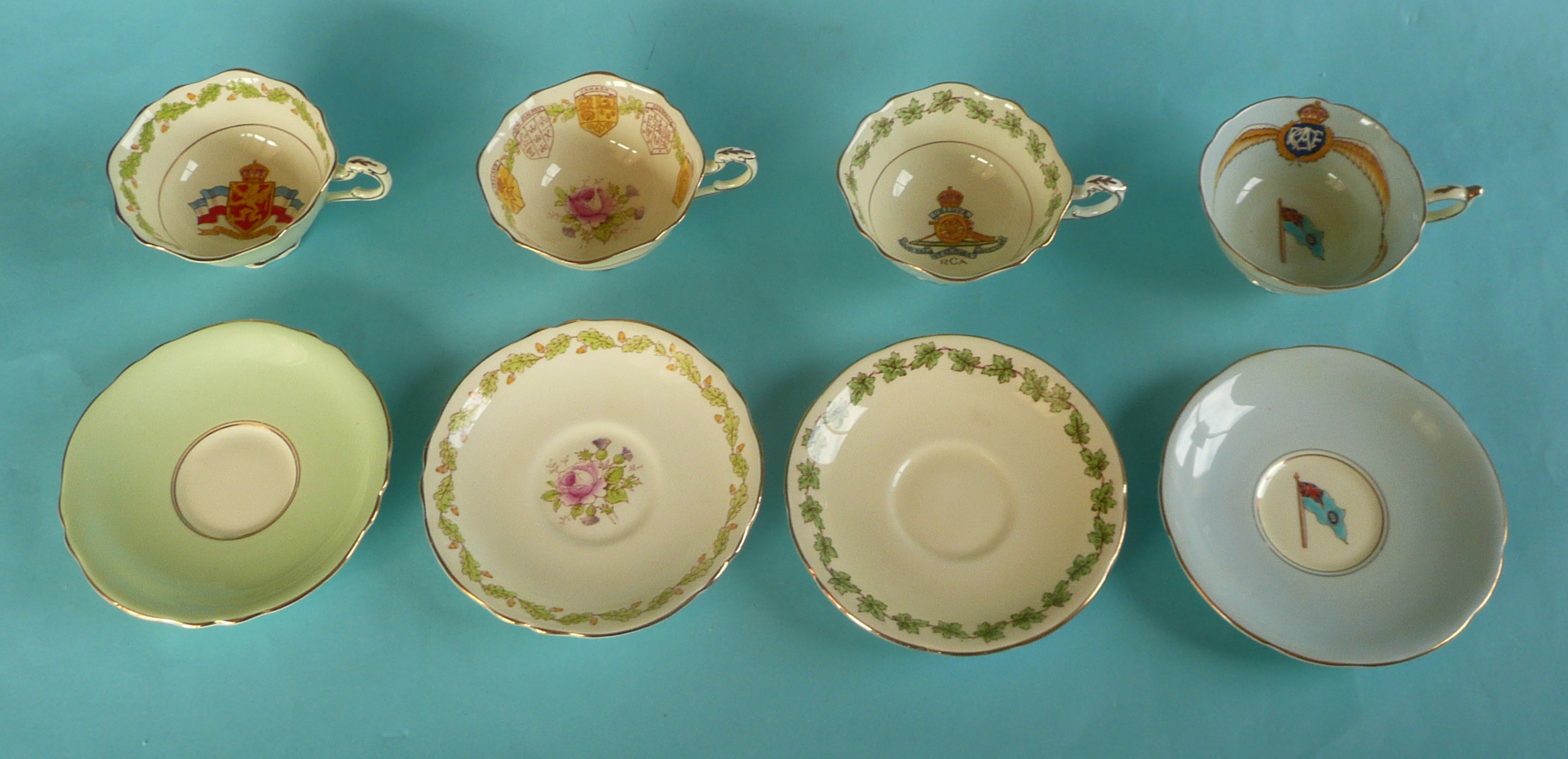 World War II: four Paragon Patriotic Series cups and saucers including RAF, RCA and shields of the