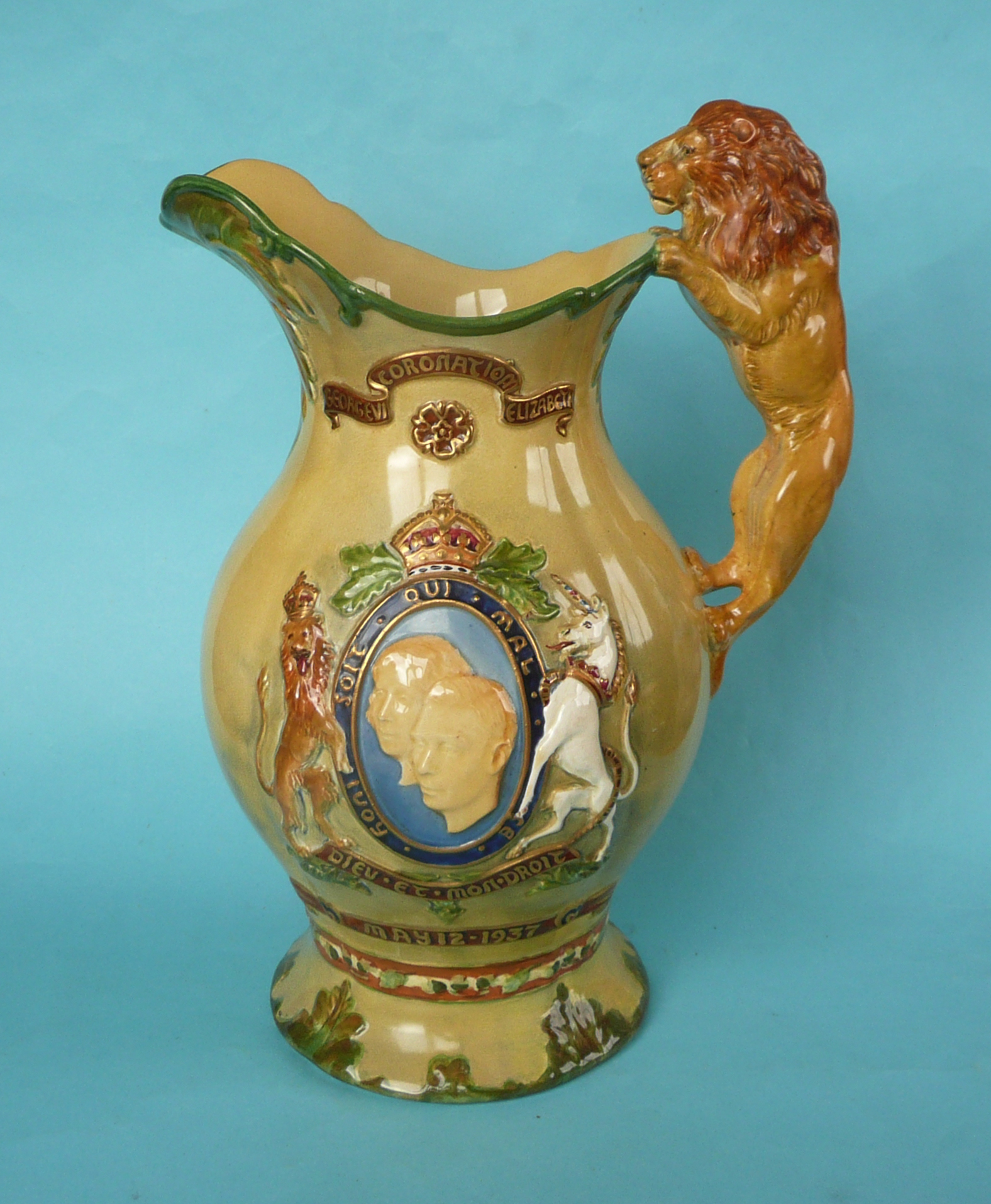 A good George VI coronation musical moulded jug impressively decorated in colours and gilt to play