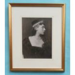 Princess Victoria of Hesse: a silver nitrate photograph by Bassano depicted half-length looking to