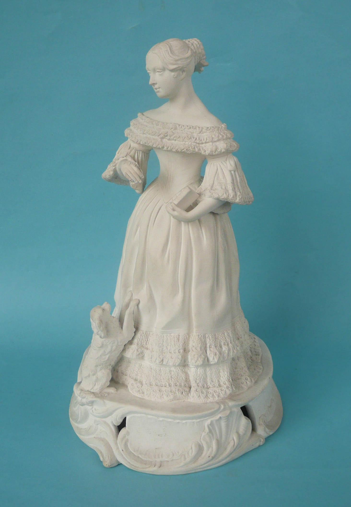 Queen Victoria: a good white bisque porcelain figure probably by Minton depicted in a long dress