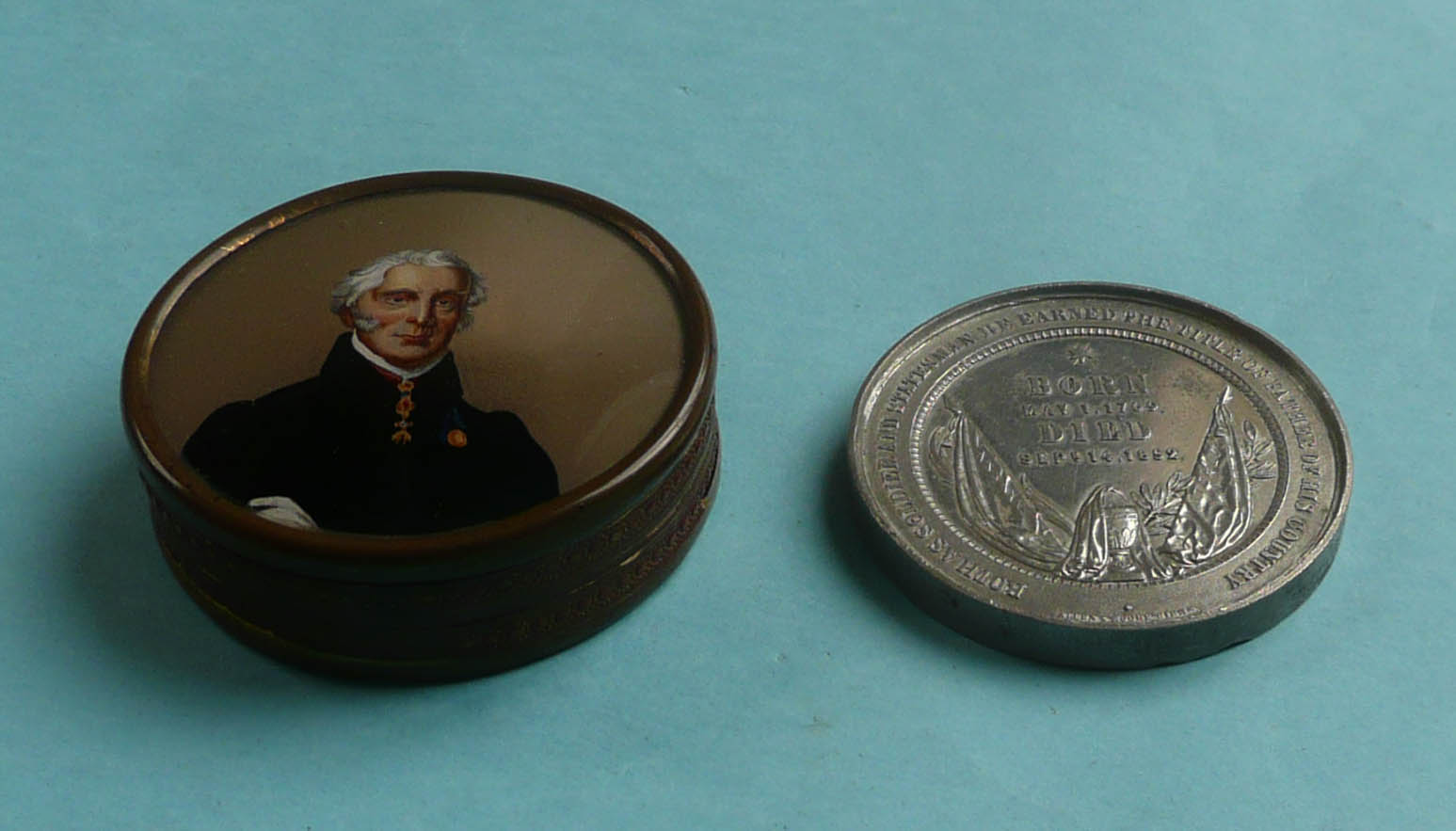 Wellington: an embossed card and brass mounted circular box, the cover with a reverse glass - Image 2 of 2