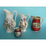 A small oviform jug, 85mm, a brick red ground jug and two floral jugs, both restored (4) (pot lid,