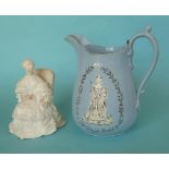 1840 Wedding: a bisque porcelain figure depicting the Queen seated, 135mm, damaged and a blue