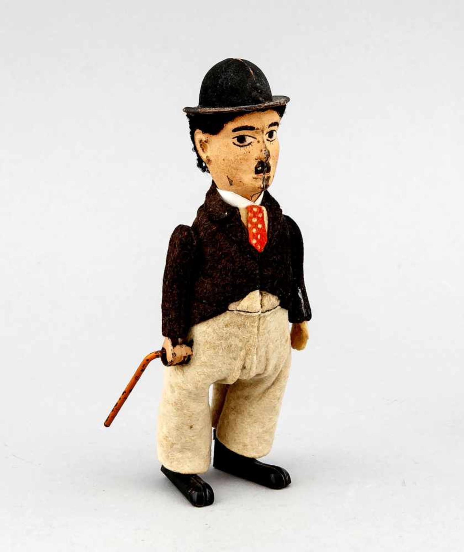 Charlie Chaplin von Schuco, ca. 1930, mechanisches Spielzeug, Blech und Filz. Schlüsselzum Aufziehen