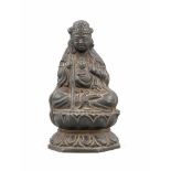 Kleine Guanyin mit Kind, wohl China, 19./20. Jh.?, Bronze mit schwarzer Patina,septagonaler