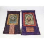 2 kleine Thangka, wohl Tibet, 1. H. 20. Jh., polychrome Pigmente und Goldstaffur aufLeinen von