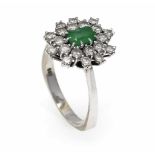 Smaragd-Brillant-Ring WG 585/000 mit einem im Smaragdschliff fac. Smaragd 0,64 ct in guterFarbe