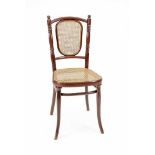 Thonet-Stuhl, um 1900, mahagonifarben gebeiztes und gebogtes Buchenholz mit Rohrgeflecht,Zarge mit