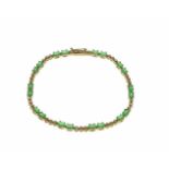 Smaragd-Brillant-Armband GG 585/000 mit 20 oval fac. Smaragden 5 x 3 mm und 15 Brillanten,zus. 0,